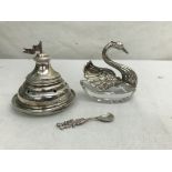 A silver salt in the form of swan;