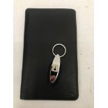 A cased Concorde wallet and keyring