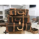 A graduated set of three Louis Vuitton Stratos suitcases