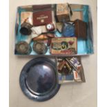 A box of odds to inc tins, matchbox holders, alarm clocks, photographs, postcards, coins,