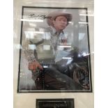 A framed & glazed signed photograph of Roy Rogers with COA
