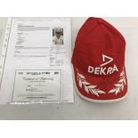 A Dekra Ferrari Michael Schumacher peaked cap with original signature on peak,