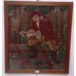 A early 20th century French Arts & Crafts style wall hanging depicting a woodcutter,