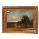 A 19th century oil depicting a landscape scene with cows,