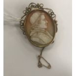 A mid-19th century cameo of a Pope in gold and pearl brooch setting