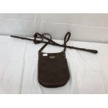 A leather Unigate milkman's shoulder bag;