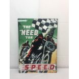 A tin sign: 'The Need for Speed'