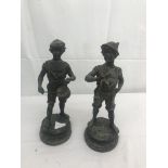 A pair of spelter figures to inc a boy playing drums and horn