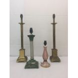 A pair of large brass candlestick lamps;