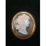 An early 20th century cameo depicting a maiden with vine leaves