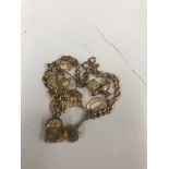 A 9ct gold charm bracelet