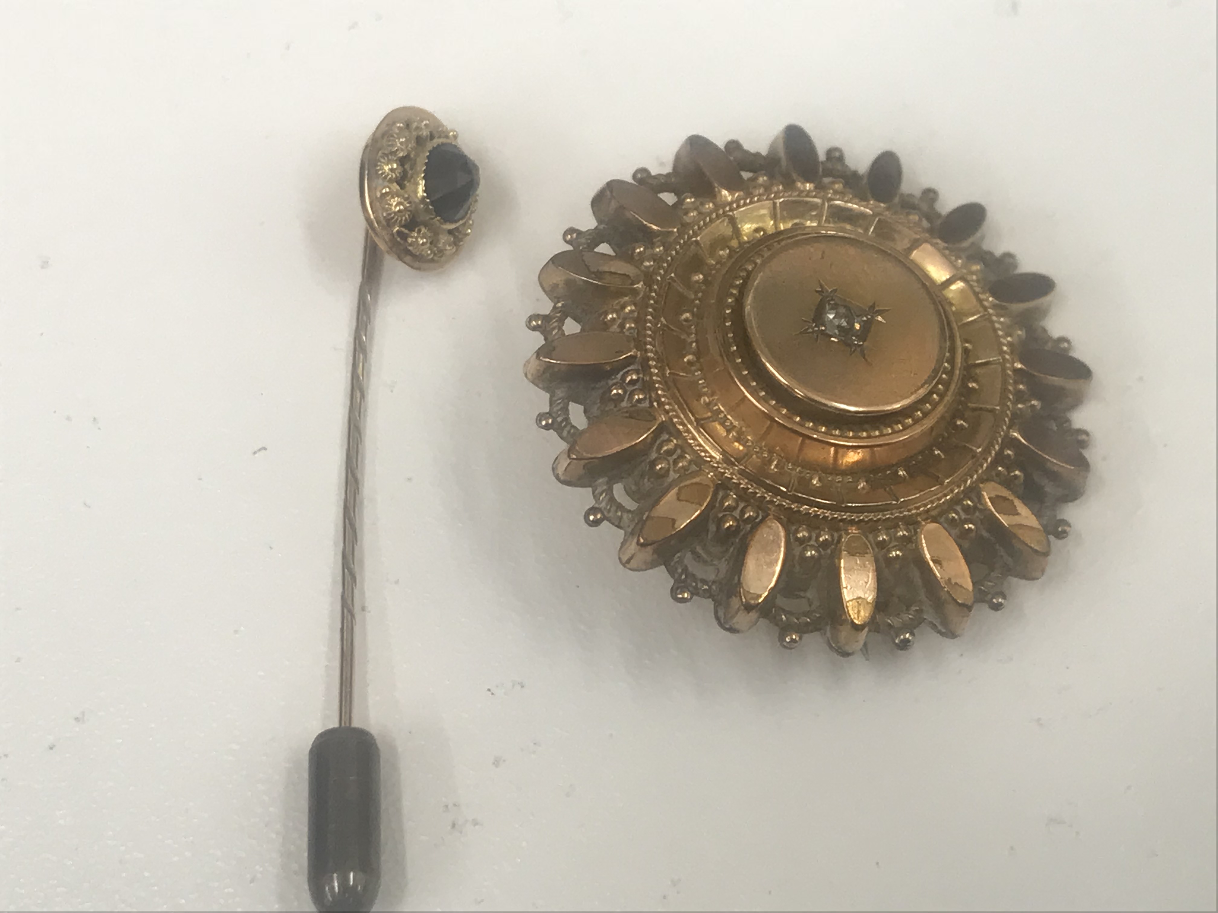 A Victorian gold brooch;