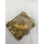 An Alexis Kirk vintage necklace and bag