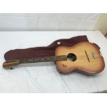 A 1960s Eko acoustic guitar with soft case (made in Italy)