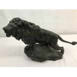 A spelter figure of a lion,