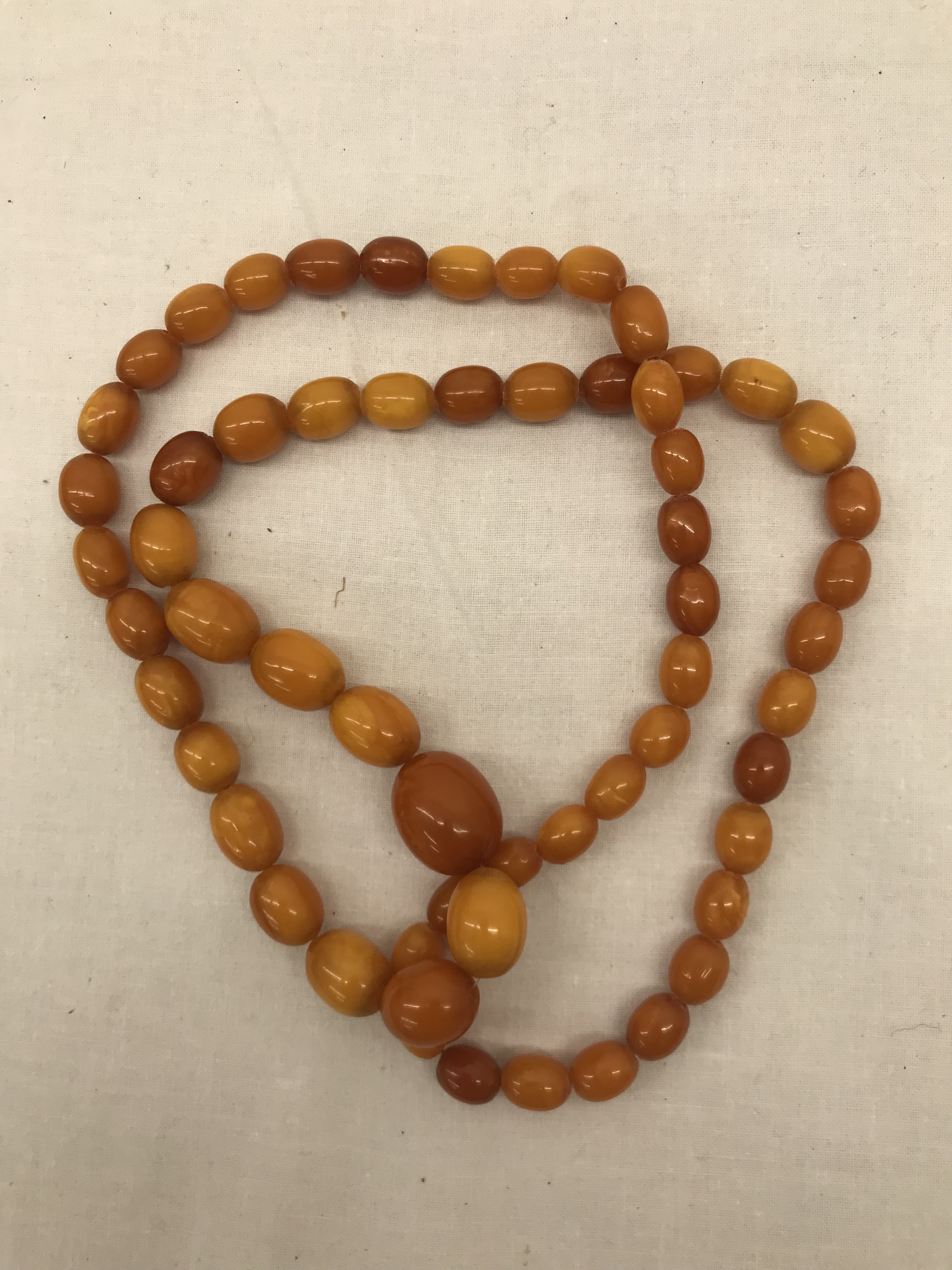 A barrel bead butterscotch amber necklace