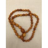 A barrel bead butterscotch amber necklace