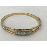 WITHDRAWN An 18ct diamond bangle