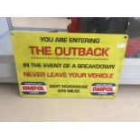 A large cast iron "The Outback" sign