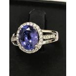 A 3ct tanzanite and diamond ring set in 18ct white gold