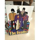 A tin sign picture of The Beatles