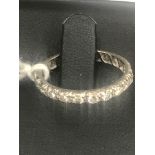 A diamond eternity ring,