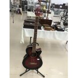 A Shine semi-acoustic bass guitar: Model GFB-106CE