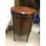 An edwardian mahogany wine cooler