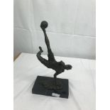 Bronze footballer on marble base