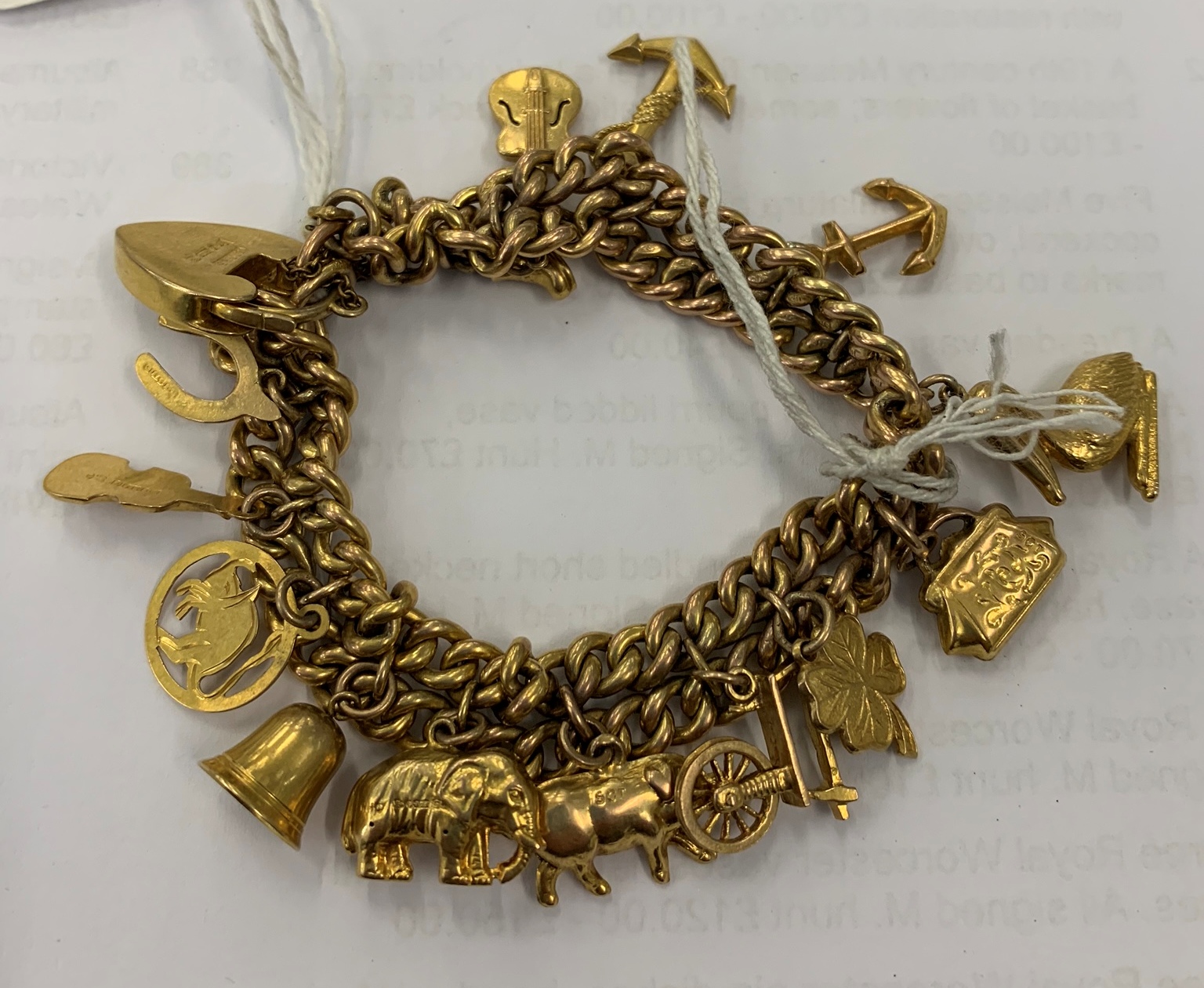 A 9ct gold charm bracelet