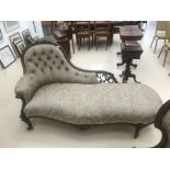 A victorian mahogany chaise lounge