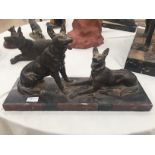 A 1930s spelter figure of 2 german shepherds on a marble base