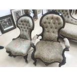 A pair of victorian mahogany framed easy chairs