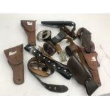 A quantity of belts, buckles,