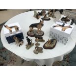 A quantity of Border Fine Arts german shepherd figures