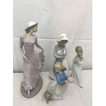 Four Nao figures, Girl with Puppy,