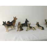 Six ceramic german shepherd figures