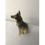 A rare Doulton figure of a seated german shepherd