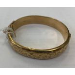 A 9ct gold bangle