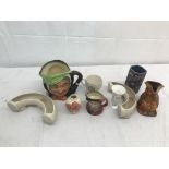 A quantity of ceramics to inc character jugs and a Moorcroft vase