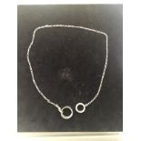 A Dolce & Gabbana ring and silver necklace set
