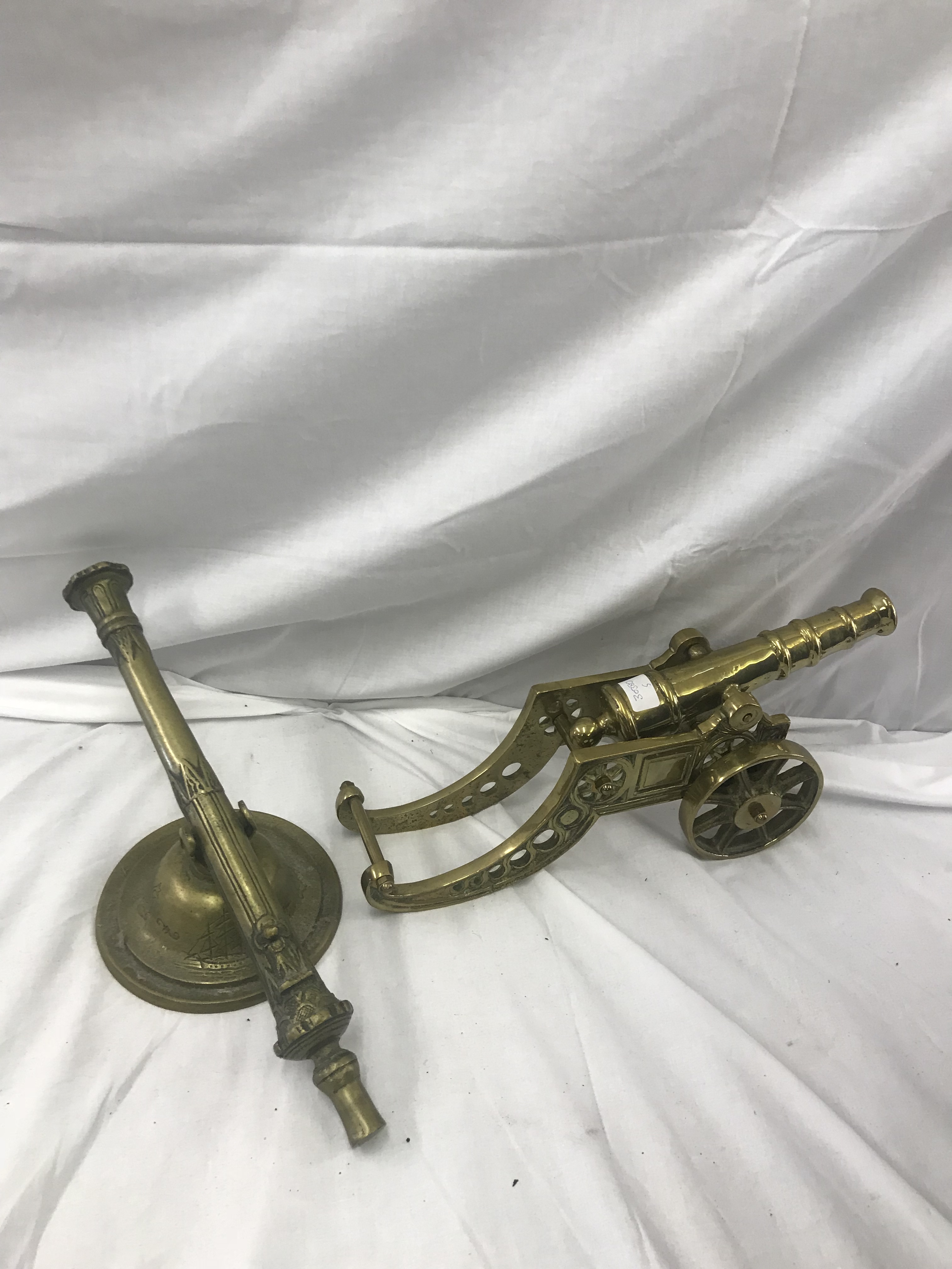 Two large brass cannon models