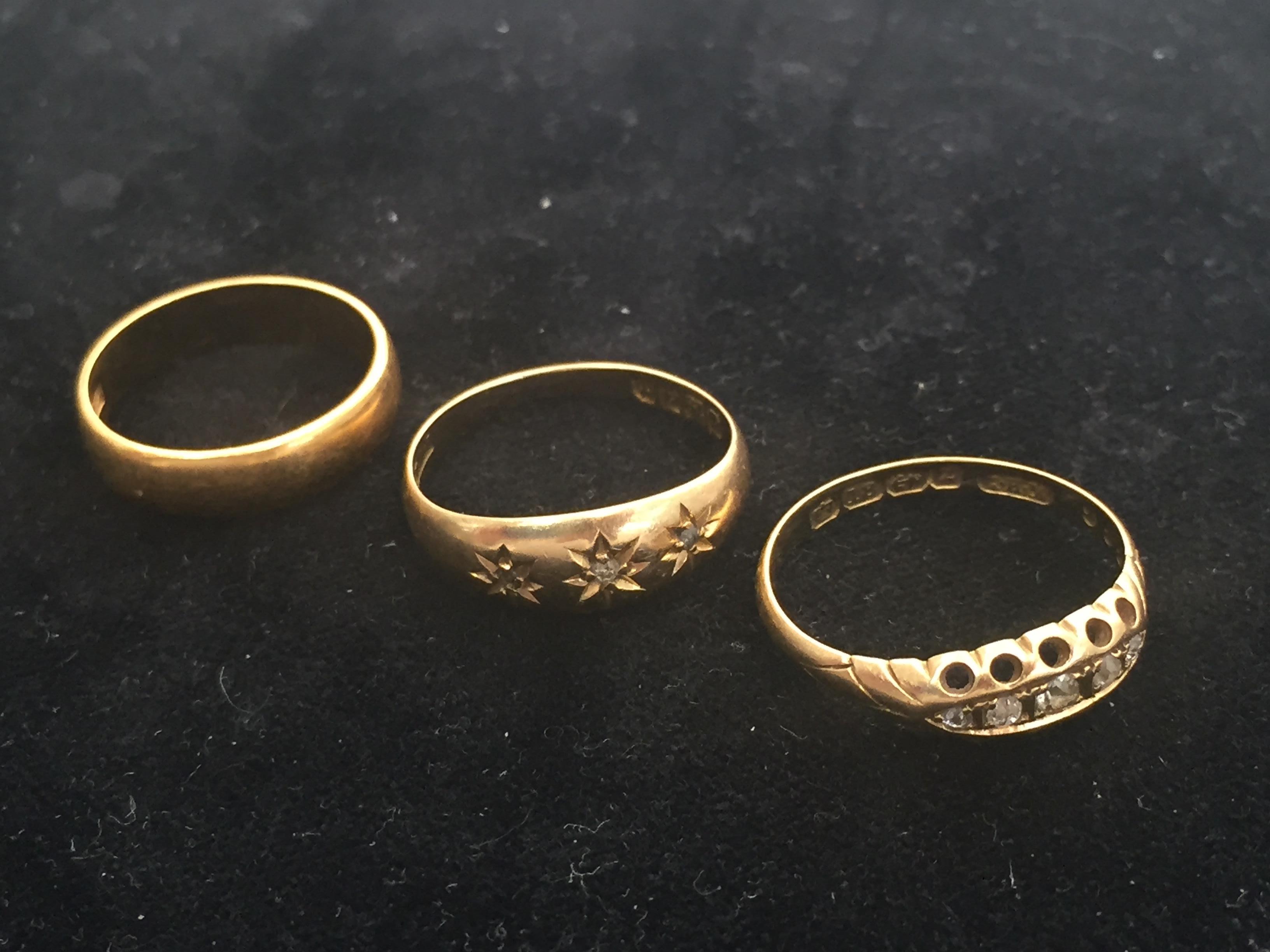 Three gold rings to inc.