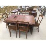 A 19th century mahogany wind out dining table together with a set of six dining chairs