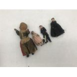 Three miniature dolls