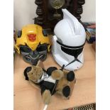 A Star Wars and Transformers helmets;