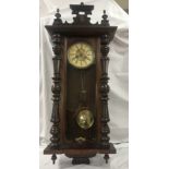 A 19th century mahogany vienna wall clock