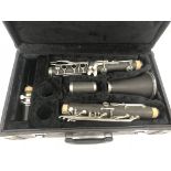 A cased hardwood clarinet