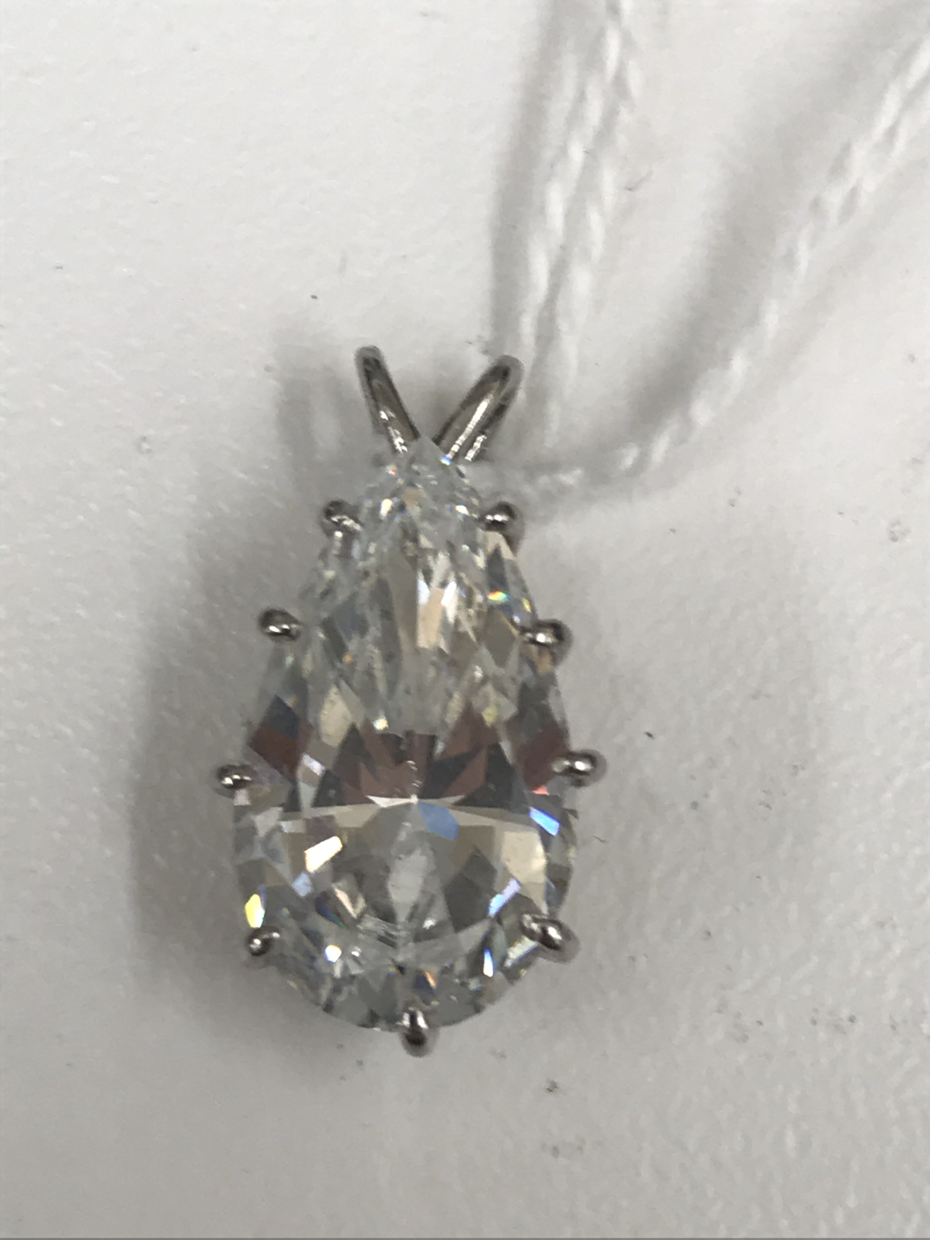 A large CZ pear-shaped pendant