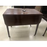 A 19th century mahogany Pembroke table on brass casters